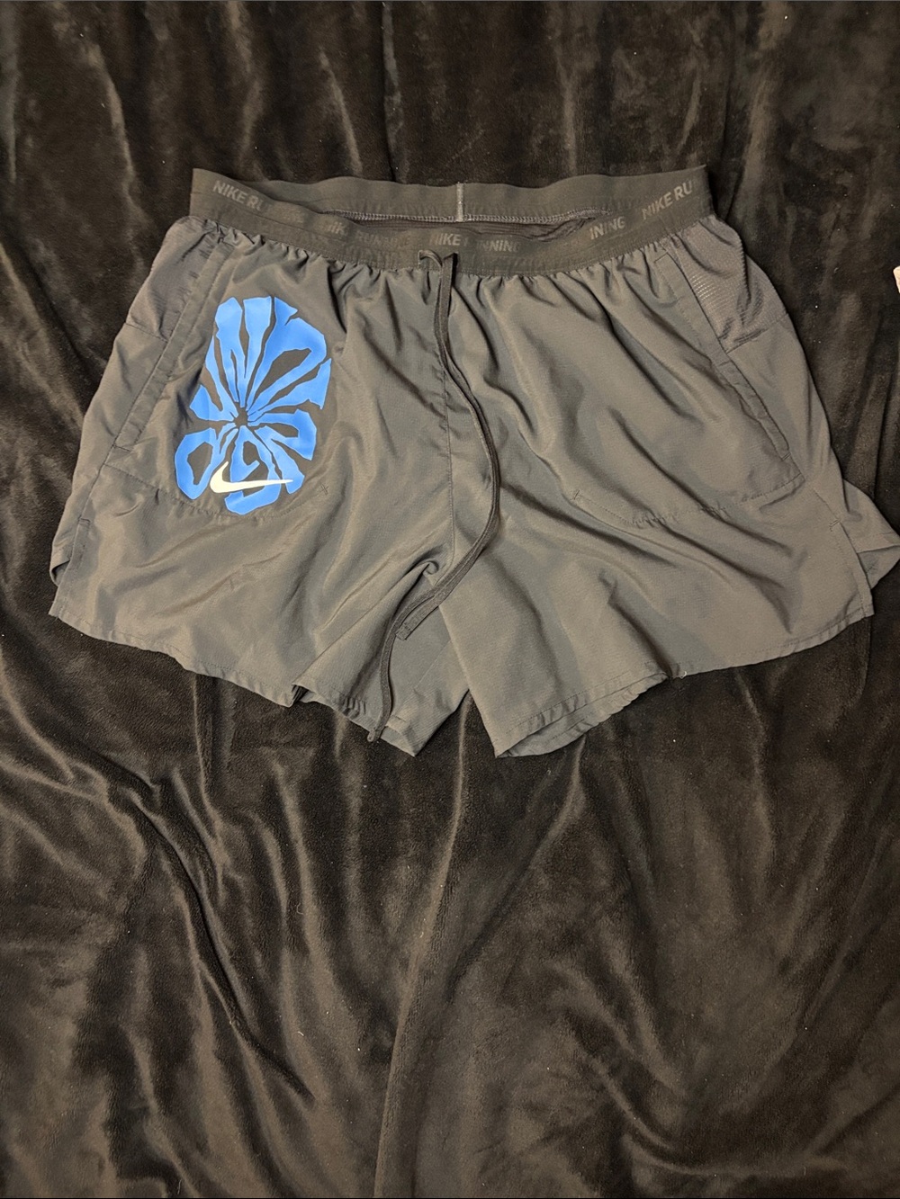 Nike Men’s Black Athletic Shorts with Blue Graphic Accent